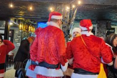 12.14.24: Vancouver BC SantaCon/Santarchy. https://technotink.net/adventures/?p=8040 Adventures of Sir Thomas Oisin Rhymour. Photo copyright by Techno Tink Photography www.technotink.com/photography. (c) 2024: Thomas Baurley./Oisin Rhymour